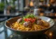 Bakso con noodles, servito con ricche polpette, coriandolo fresco e peperoncino