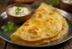 Ghee dosa fresco, cotto croccante, servito con ripieno speziato
