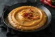 Salsa piccante alle arachidi servita