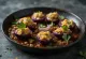 Bharwa Baingan, melanzane ripiene con ricca salsa speziata