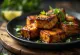 Tofu Jerk servito con coriandolo e decorato con peperoncino rosso