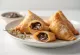 Samosa al cioccolato, fritti dorati, con ripieno all'interno