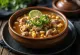 Pozole di Maiale, zuppa messicana di maiale con mais hominy, lime e jalapeño