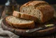 Ruisleipä tondo con lievito madre e crosta rustica, infarinato, su superficie di legno